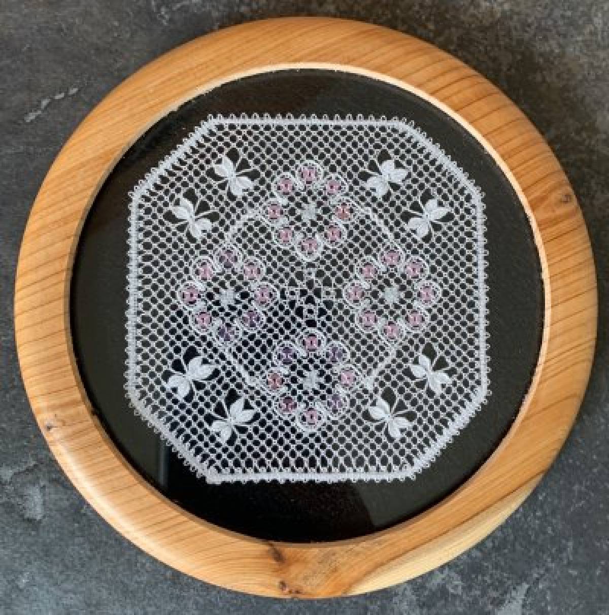 Daisy chain bottle coaster by sally smiddy